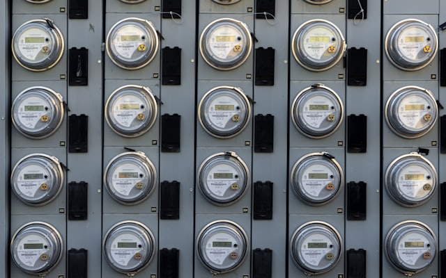 A bank of modern digital electric utility meters