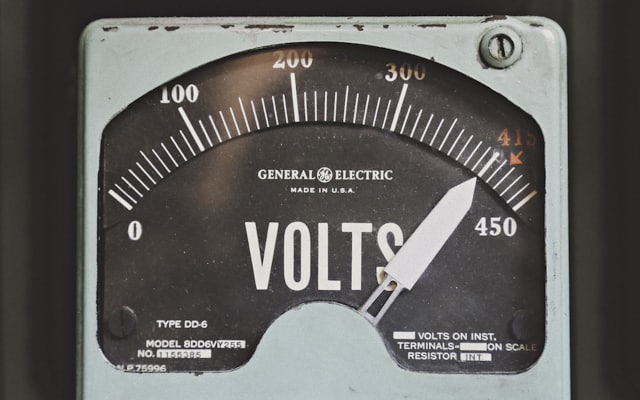 A residential electricity meter on an exterior wall