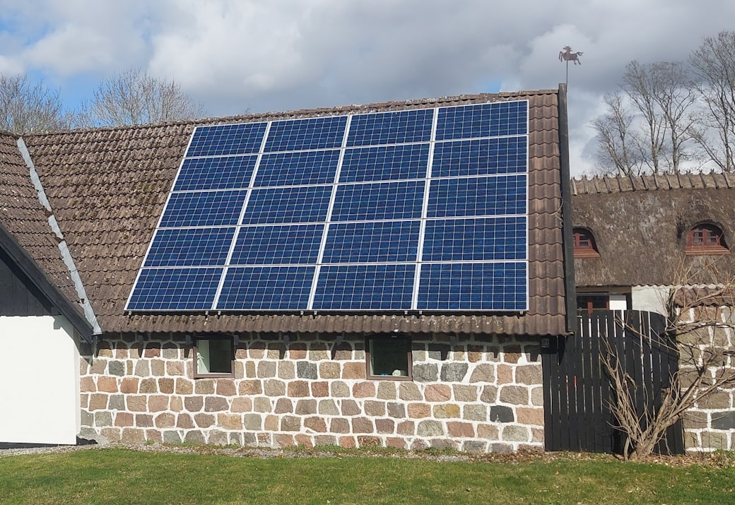 Solar panels installed across the roof of a family home